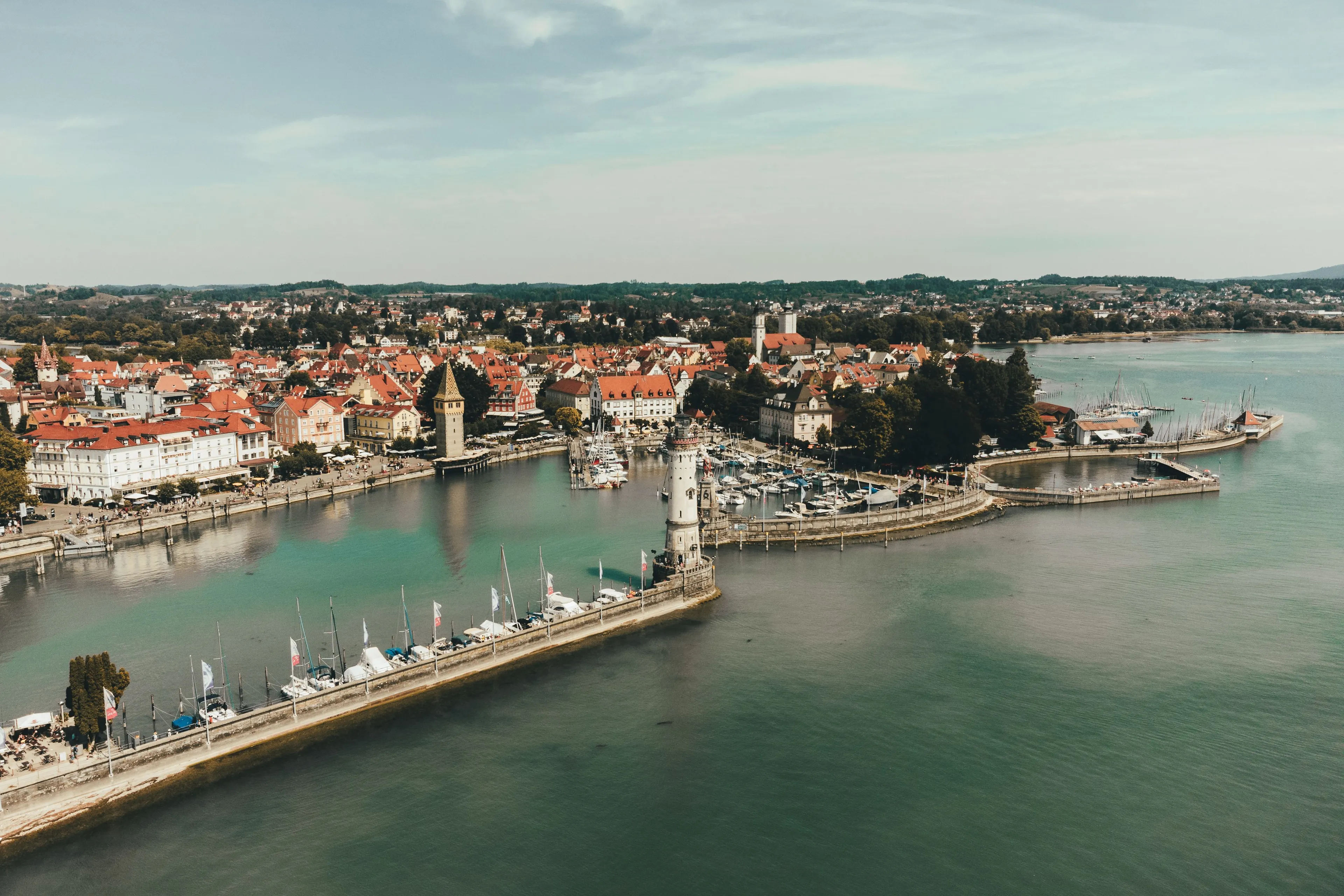 Aerial view of Lindau harbour with the lighthouse, the Bavarian lion and the Mangturm